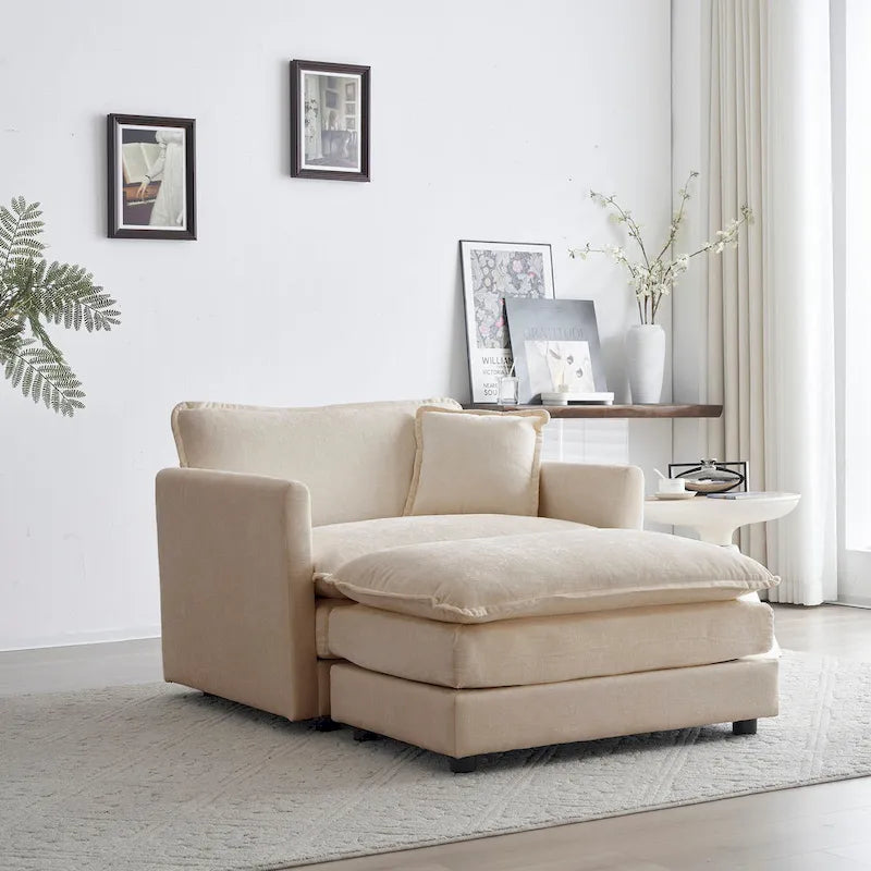 Poltrona moderna con pouf imbottito