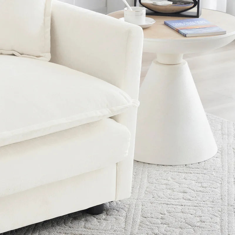 Poltrona moderna con pouf imbottito