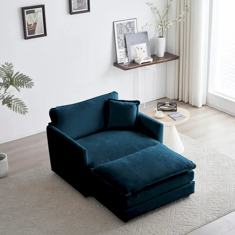 Poltrona moderna con pouf imbottito