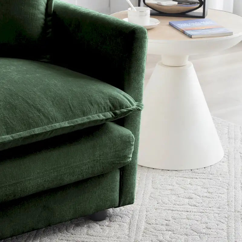 Poltrona moderna con pouf imbottito