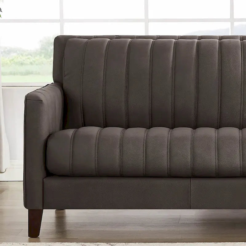 Divano in pelle fiore Hydeline Ennis con piume, memory foam e molle
