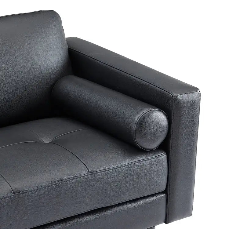 Moderne bank van echt leer met houten poten en extra lendekussen