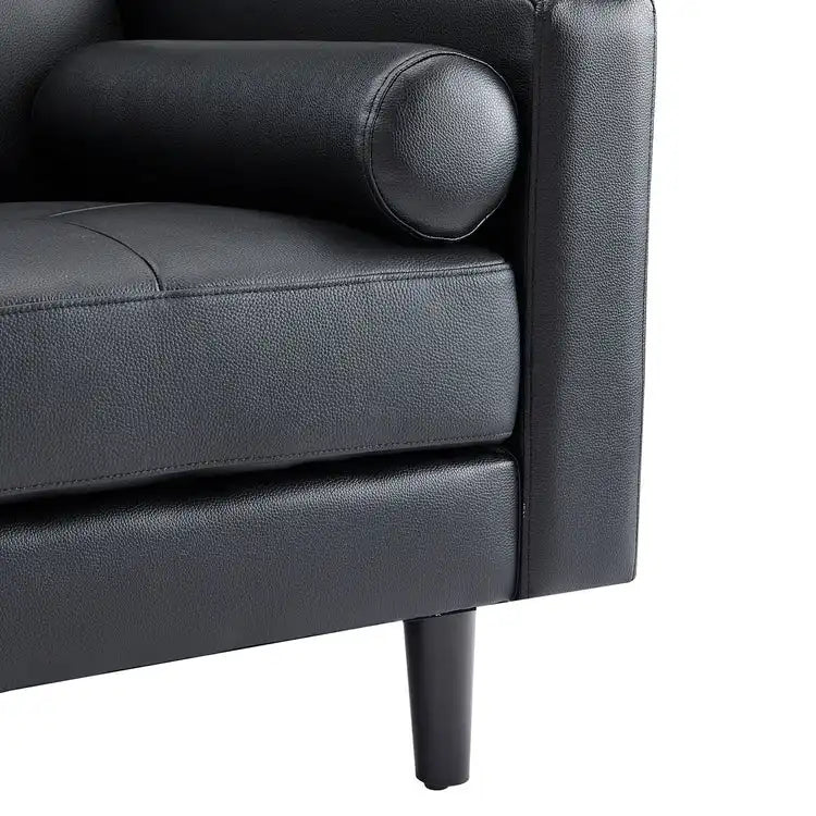 Moderne bank van echt leer met houten poten en extra lendekussen