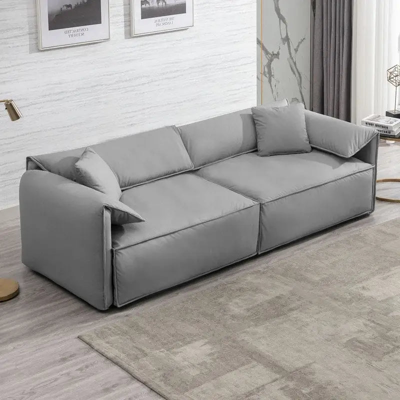 Divano a quattro posti imbottito Mixoy Widened con seduta profonda, divano minimalista in stile italiano da 97 pollici con bracciolo a orecchio di elefante, cuscino decorativo