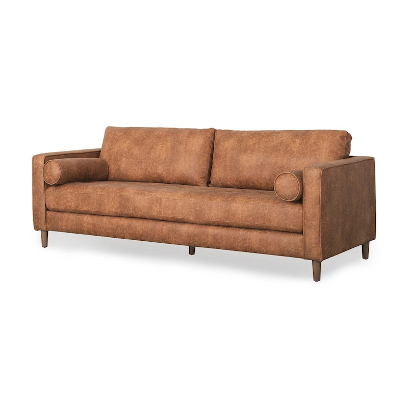 Divano a tre posti Loretta in similpelle color cognac con cuscini a rullo - 87.9L x 36.2P x 33.8A