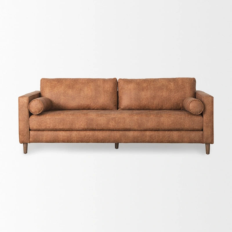 Divano a tre posti Loretta in similpelle color cognac con cuscini a rullo - 87.9L x 36.2P x 33.8A
