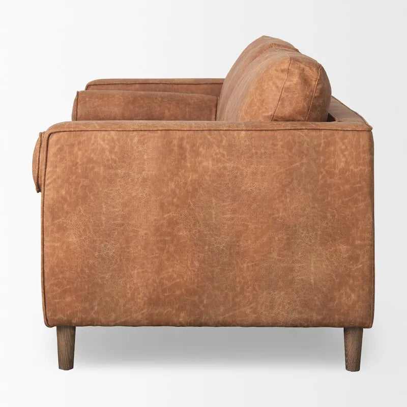 Divano a tre posti Loretta in similpelle color cognac con cuscini a rullo - 87.9L x 36.2P x 33.8A