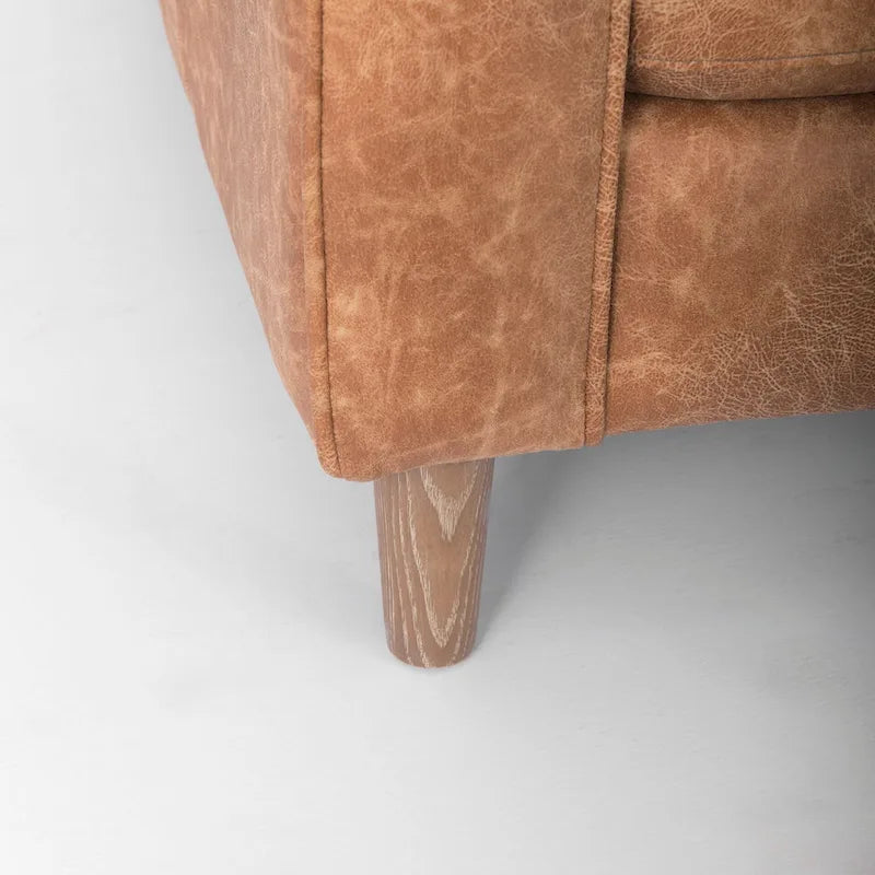 Divano a tre posti Loretta in similpelle color cognac con cuscini a rullo - 87.9L x 36.2P x 33.8A