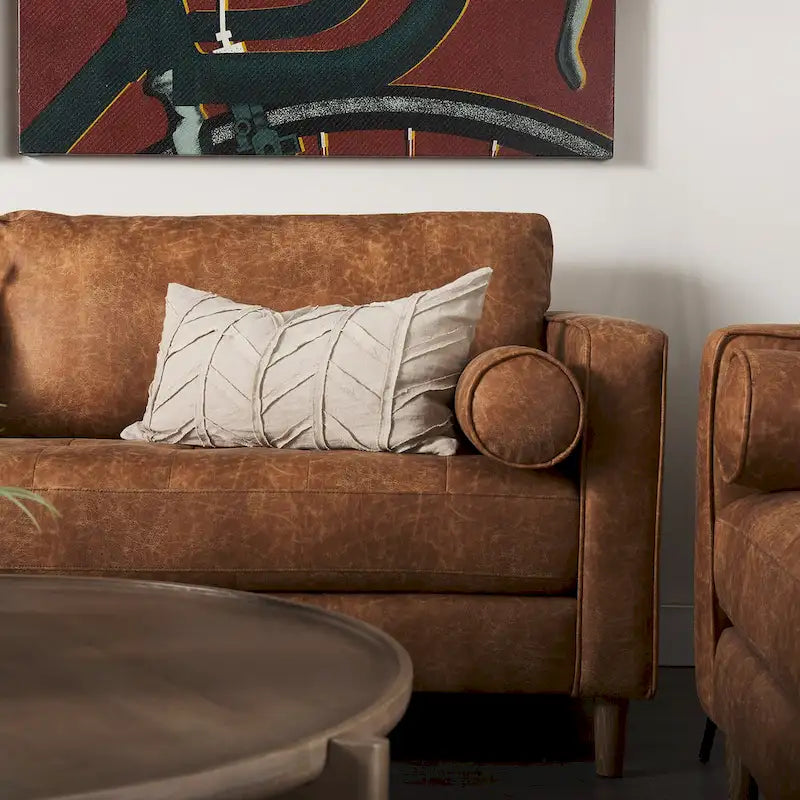 Divano a tre posti Loretta in similpelle color cognac con cuscini a rullo - 87.9L x 36.2P x 33.8A