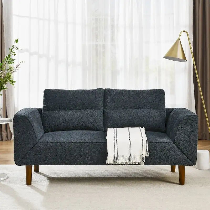 Sufan loveseat futon konvertibbli li jintuża bħala sodda