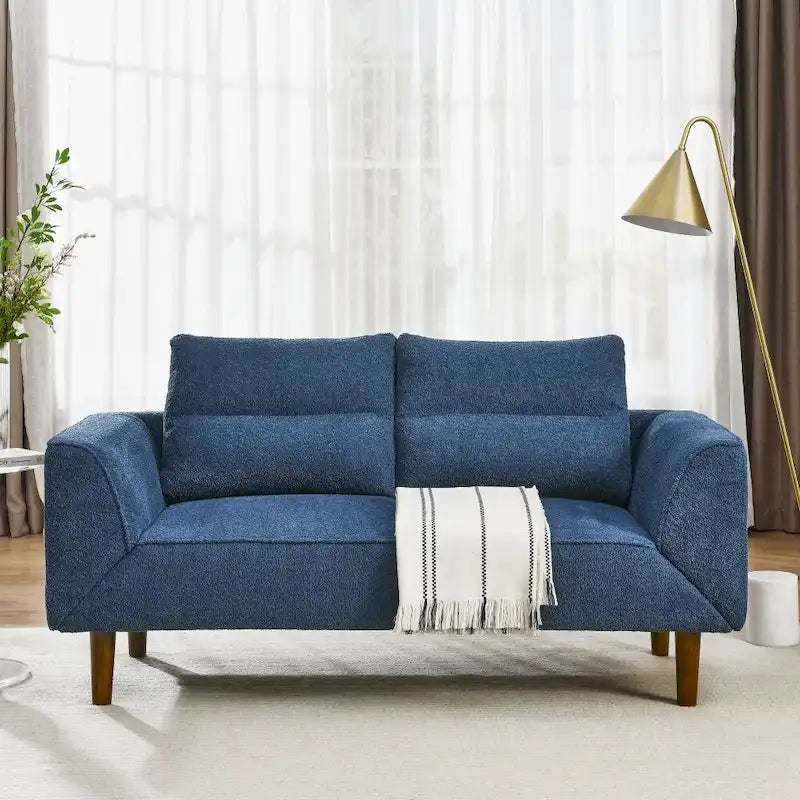 Sufan loveseat futon konvertibbli li jintuża bħala sodda