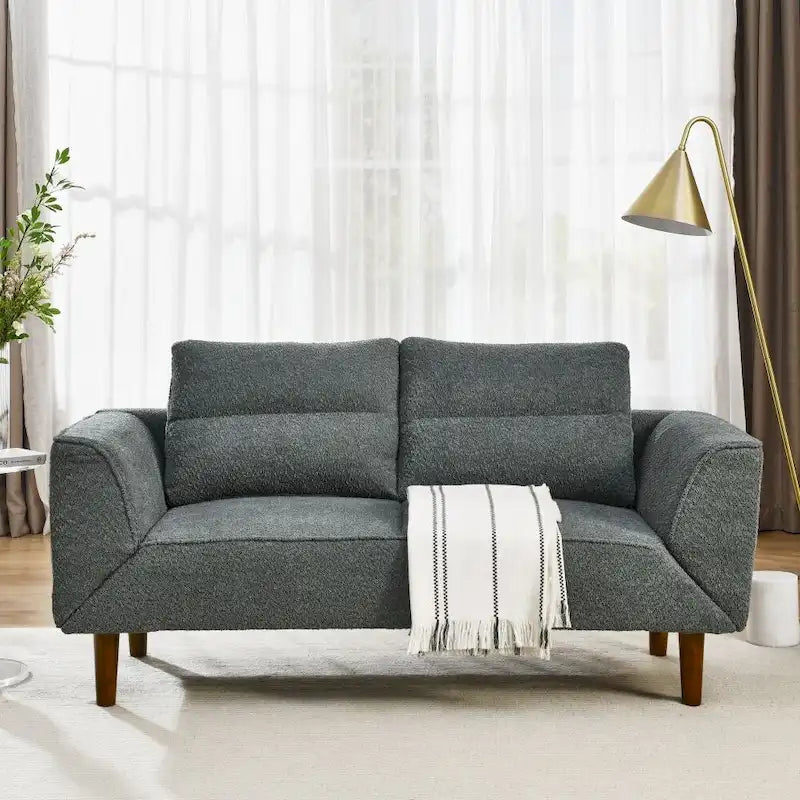 Sufan loveseat futon konvertibbli li jintuża bħala sodda
